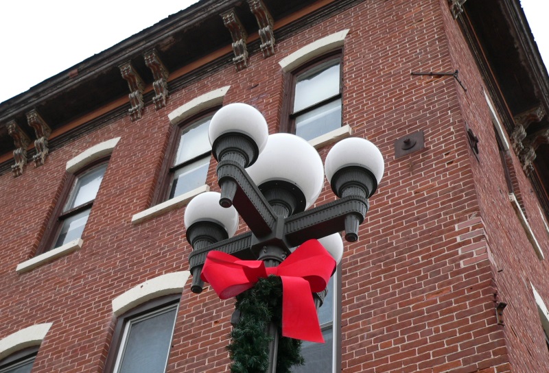 Three City Staffers Decorate 50 Lamp Posts