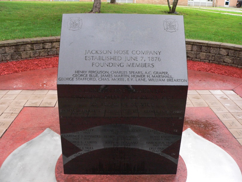 Firefighters Clean Morrison Fire Department Memorial