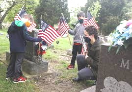 Volunteer to Place Flags on Veterans’ Graves